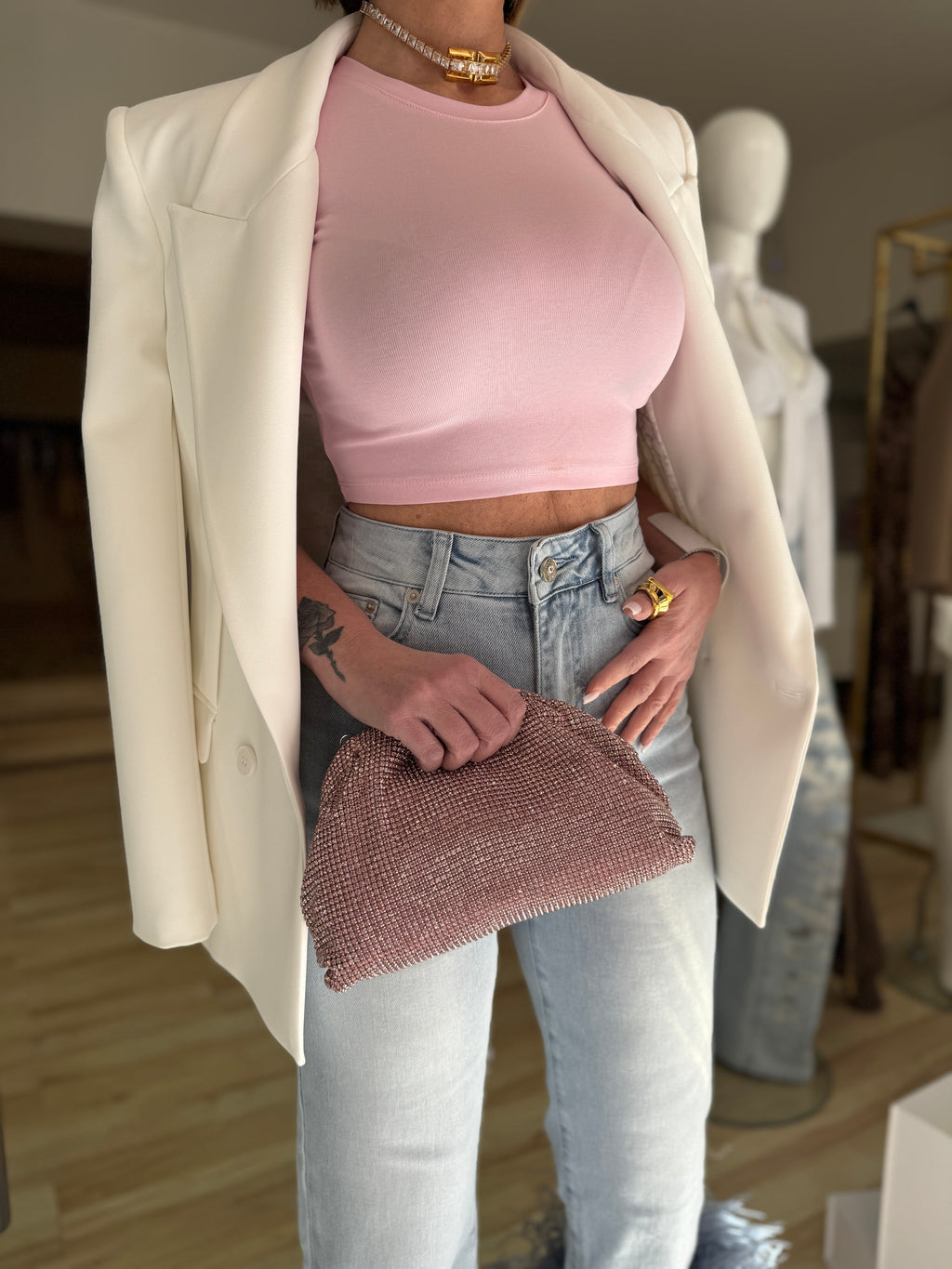 Jeans con piume
